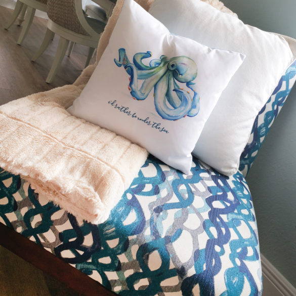 decorating small coastal homes with blue octopus throw pillow