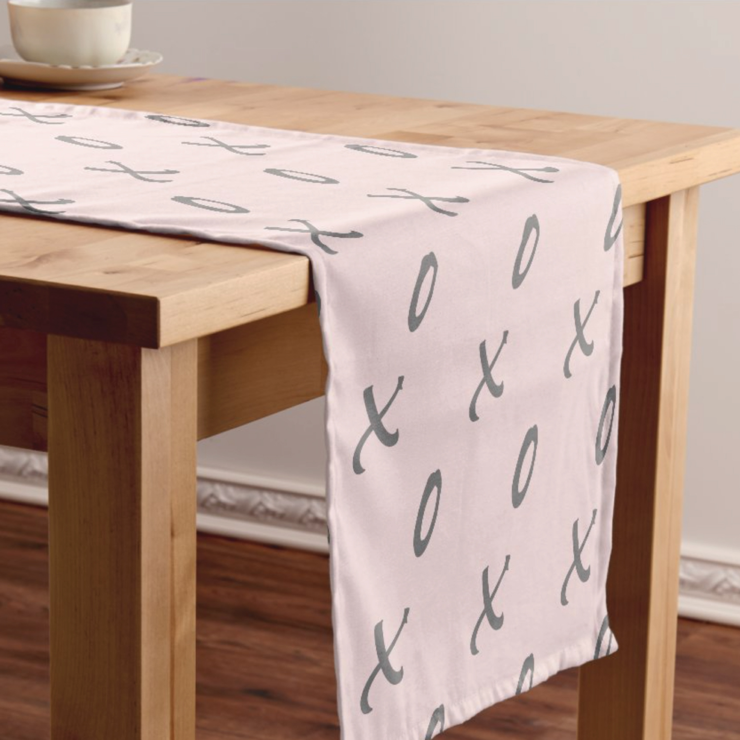 This modern pink and gray table runner is perfect for Valentine's and Galentine's day parties. It features a pattern of x's and o's. Use as a party decoration, home decor, baby shower or anything you like. Click to shop