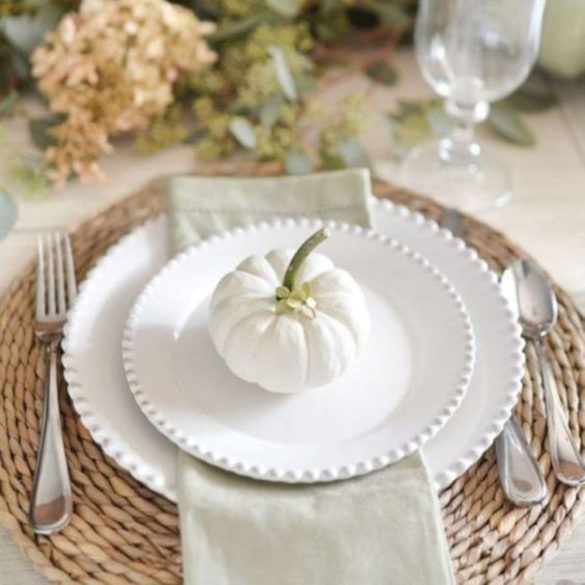 friendsgiving place setting ideas with white pumpkin