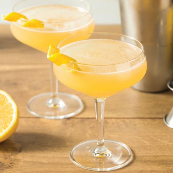 classic mimosa made with orange juice and a twist