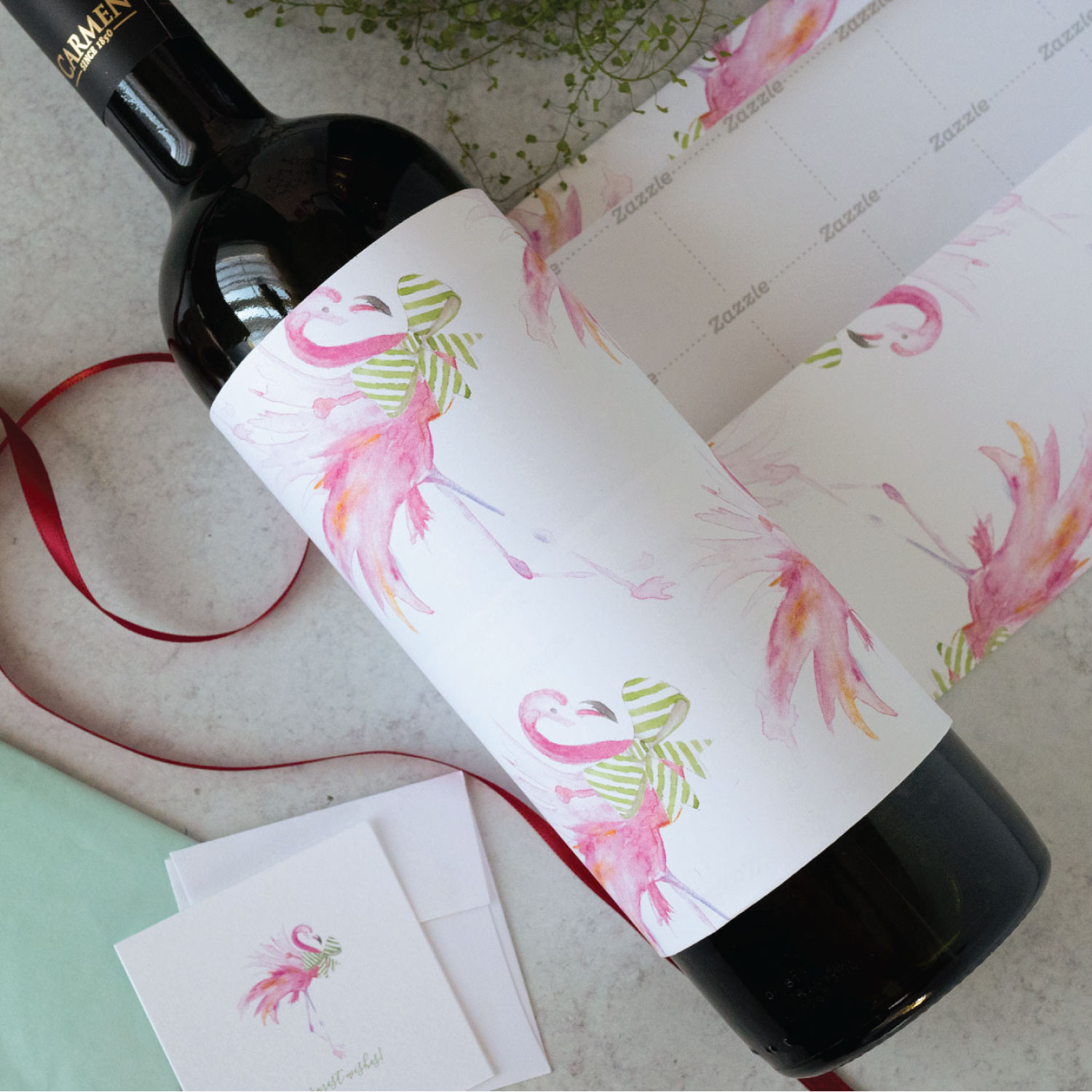 How to gift wrap a wine bottle using pink flamingo gift wrapping paper with guides by Victoria Grigaliunas