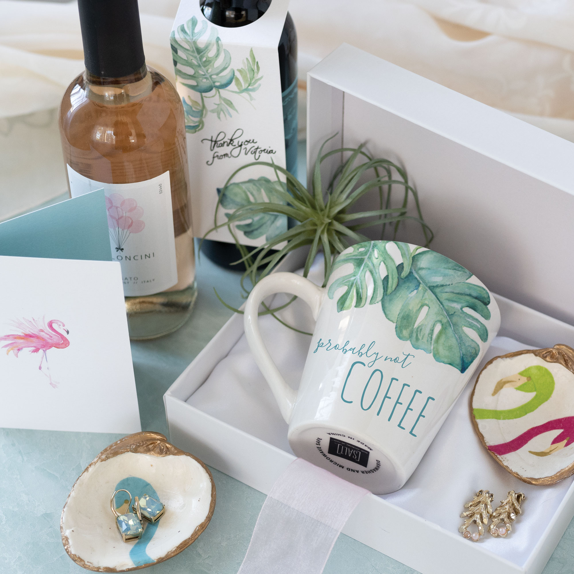 A cute gift box idea for your bridal party or friend features a tropical flair. 