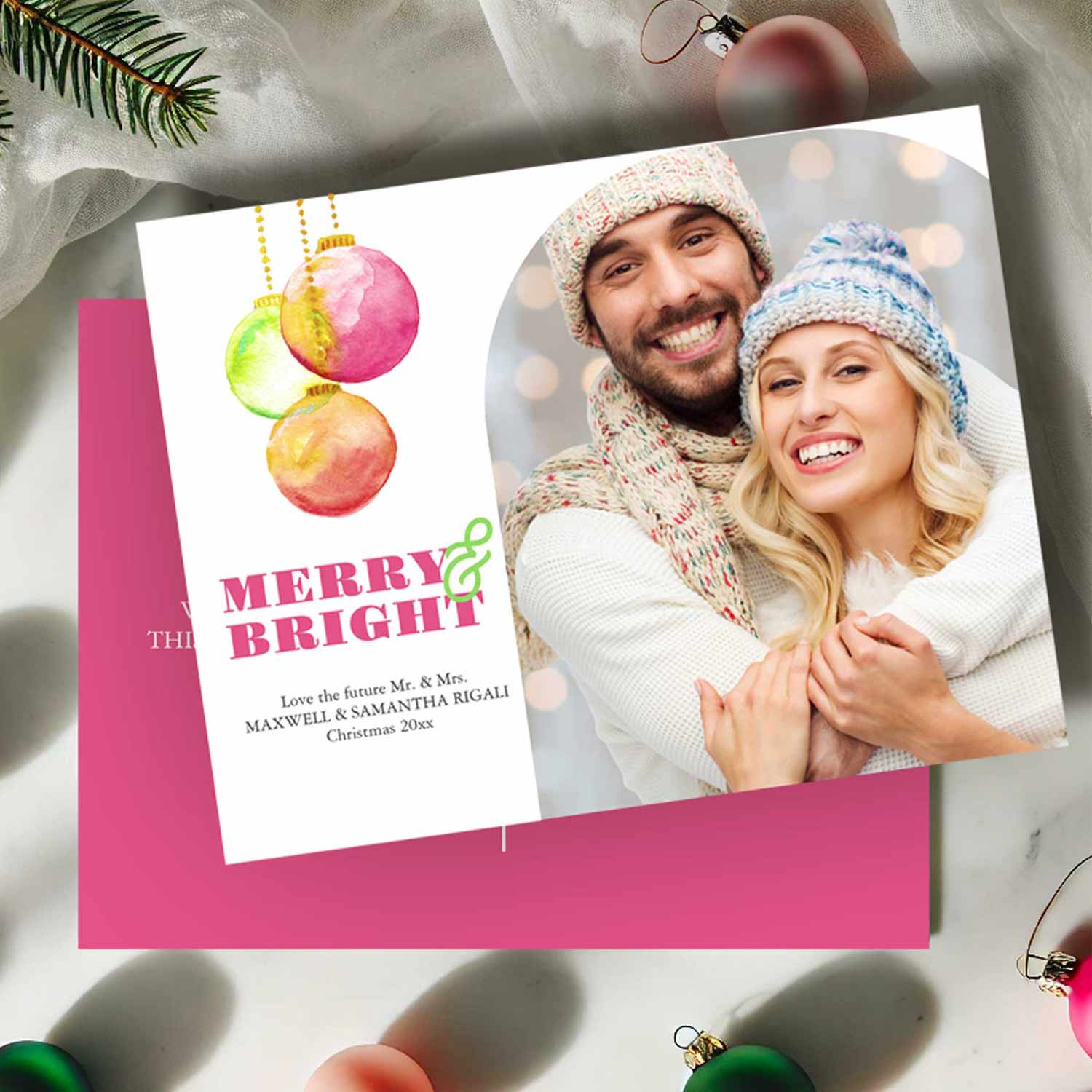 Pink photo Christmas cards designed with watercolor baubles. Customizable online with your photo and wording. Shop Do Tell A Belle a small business in the Zazzle marketplace. 