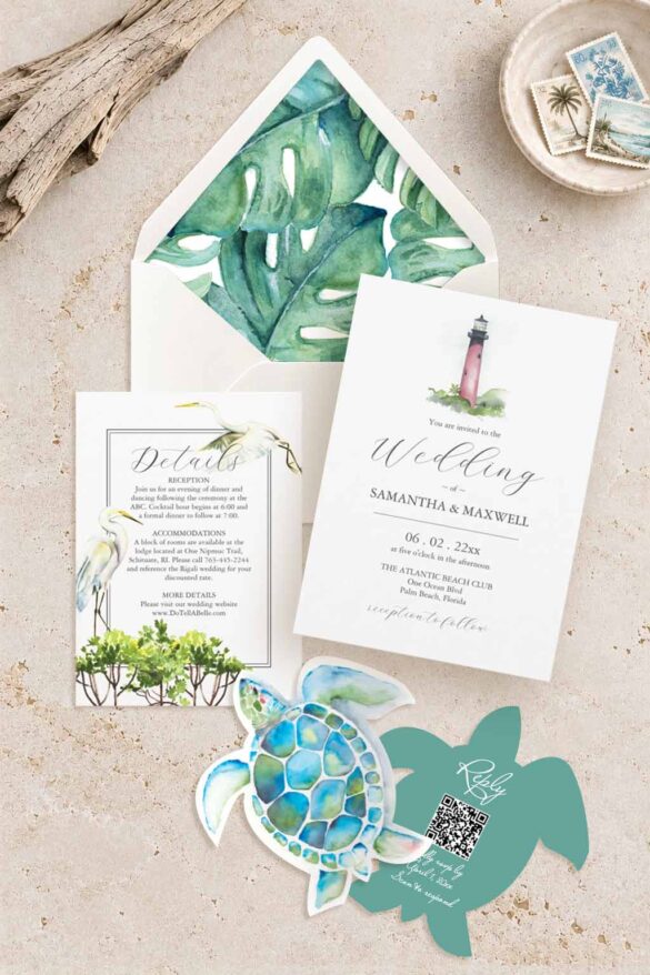 Destination wedding invitation suite with Jupiter Lighthouse, white birds, tropical greenery, sea turtle RSVP and monstera envelope liner.