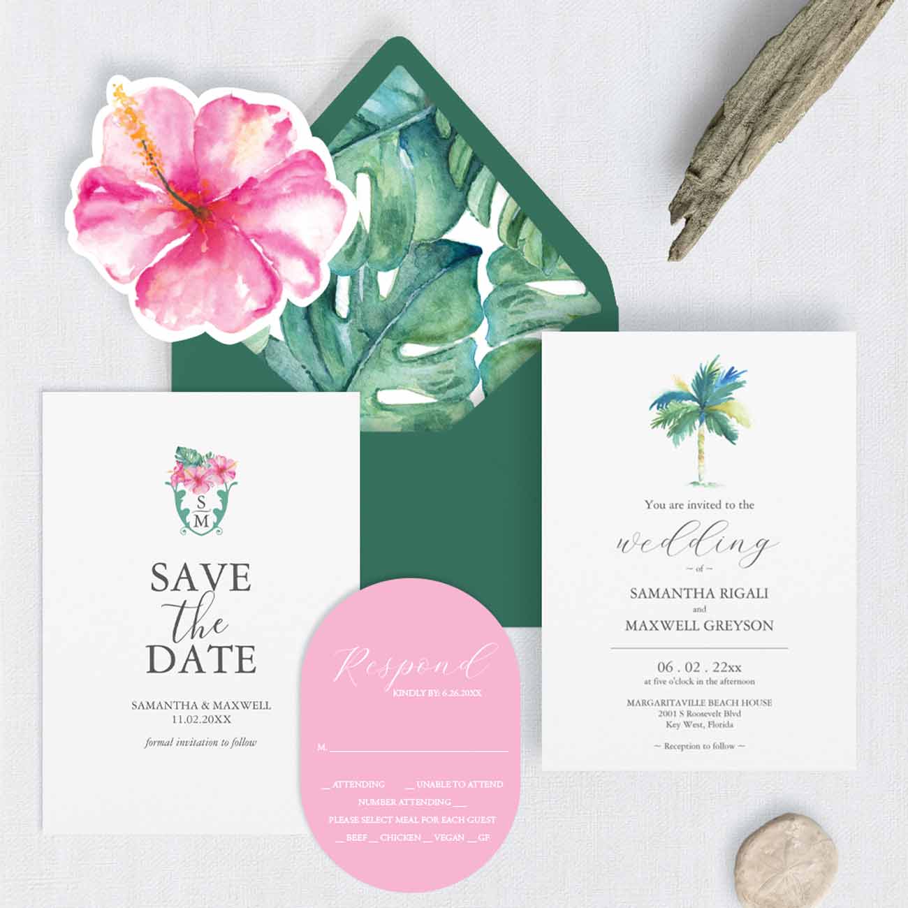 Tropical watercolor wedding invitations for destination weddings featuring a palm tree wedding invitation, monstera leaves envelope liner, pink florals, and a die cut hibiscus insert card in a pink and green wedding color palette.