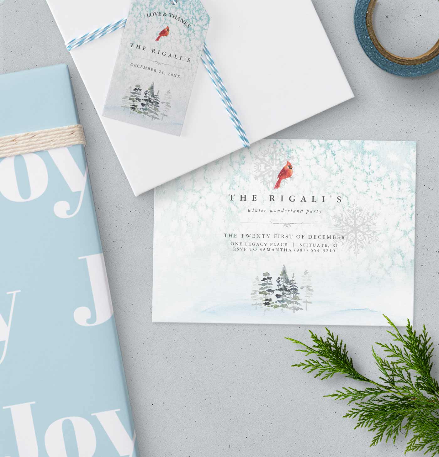 winter wonderland holiday party theme features pale blue snowy invitations, gift tags and wrapping paper. Click to shop the complete line.