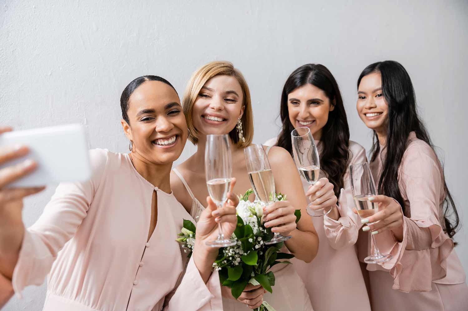 When should I send out bridal shower invitations. Image of bridal party.