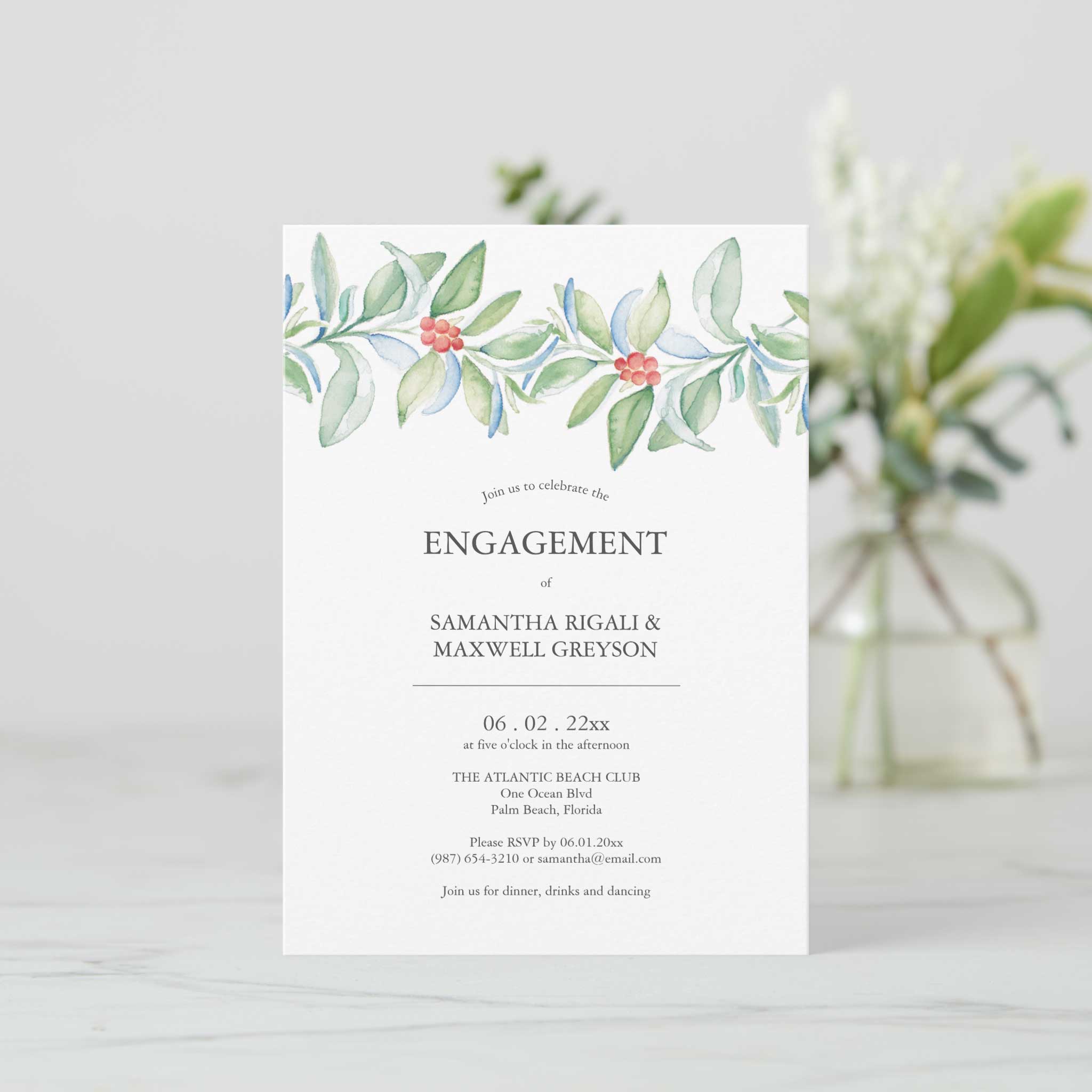 winter engagement party invitations feature Christmas botanicals