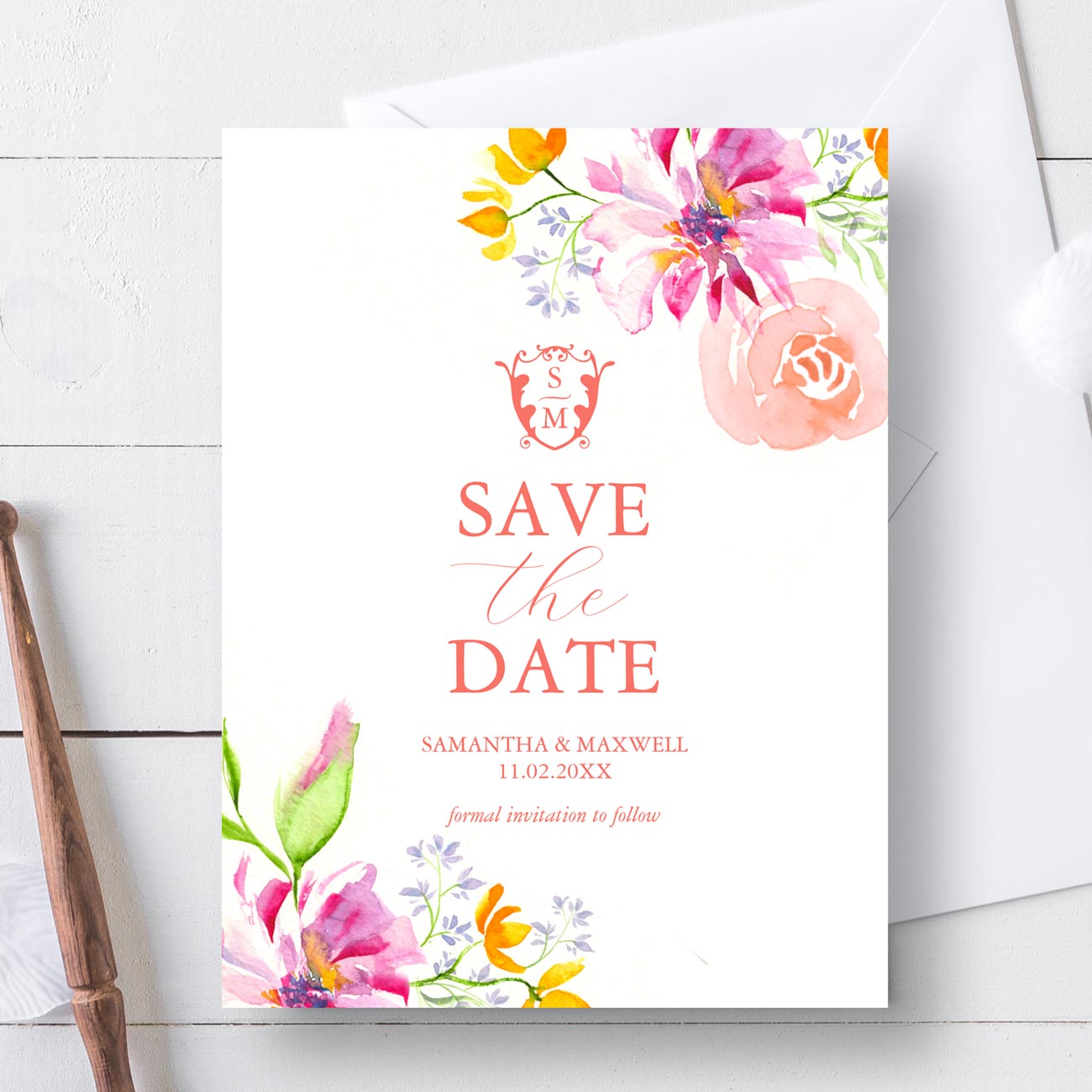 Save the date features beautiful watercolor floral and monogram art by Victoria Grigaliunas of Do Tell A Belle. Click to shop this design.