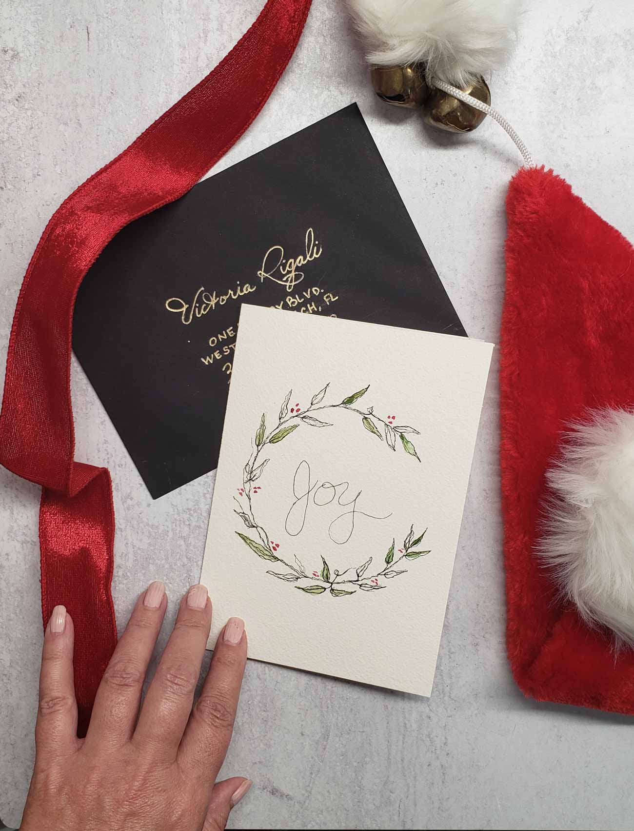 Easy DIY Christmas cards feature unique watercolor and line art tutorial by Victoria Grigaliunas of Do Tell A Belle.