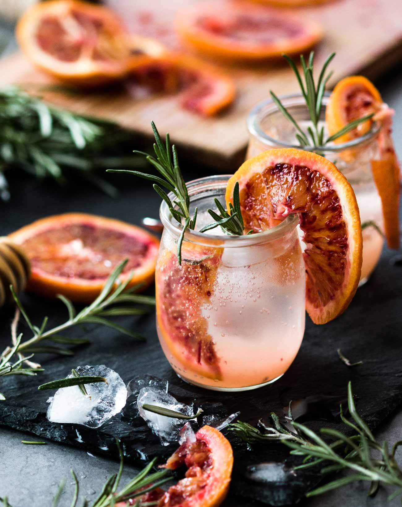 Unique old fashioned cocktail infused with rosemary and muddled blood oranges. 