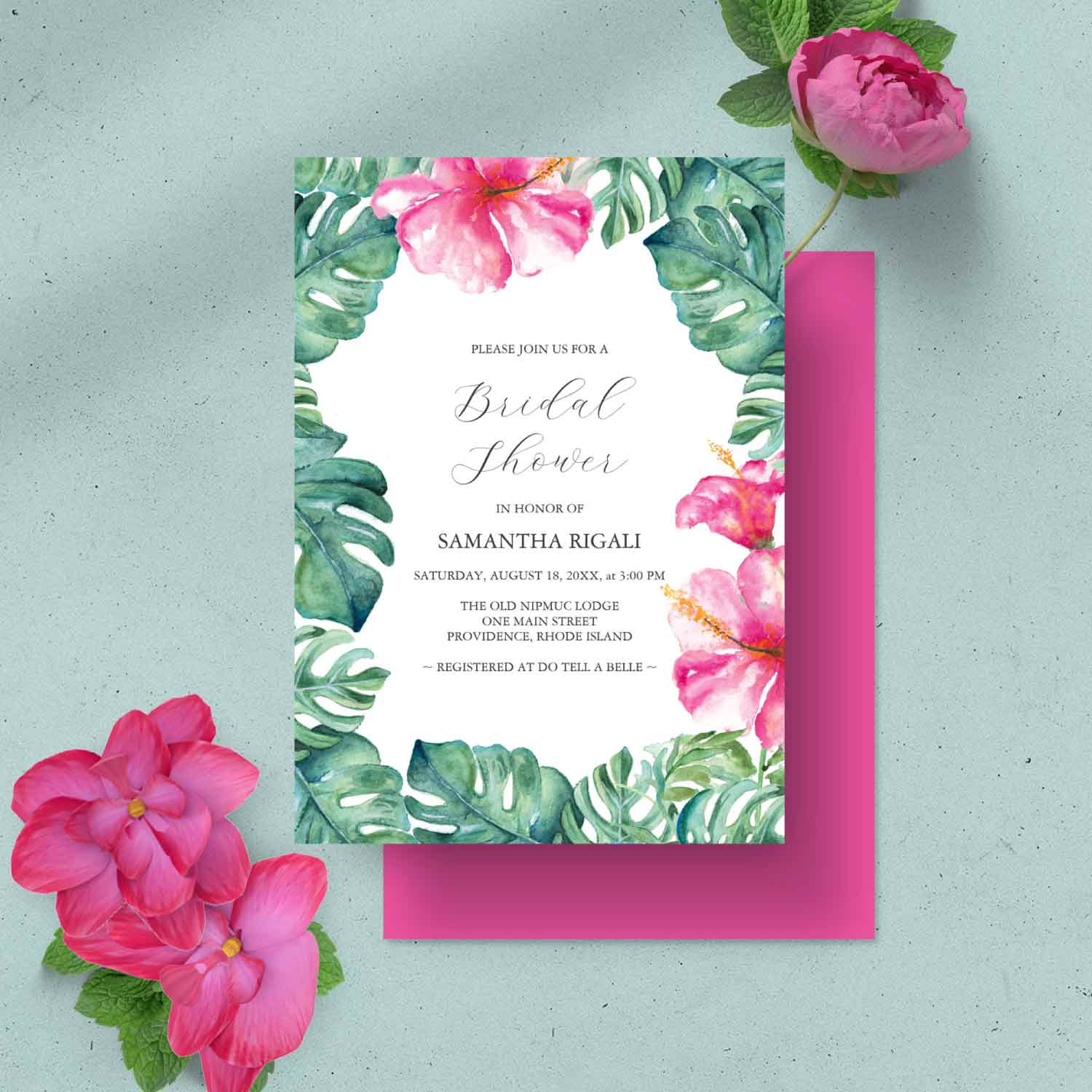 Bridal shower invitations feature tropical hibiscus flowers in vibrant shades of pink. Click to shop more watercolor bridal shower invitations by Victoria Grigaliunas of Do Tell A Belle.