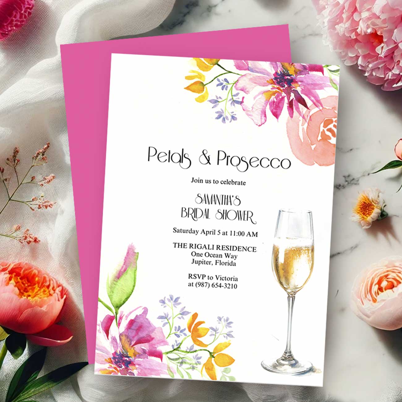 Pink bridal shower invitation featuring hand-painted pink and orange watercolor florals with bright pink back, by Do Tell A Belle. Perfect for a bridal brunch.