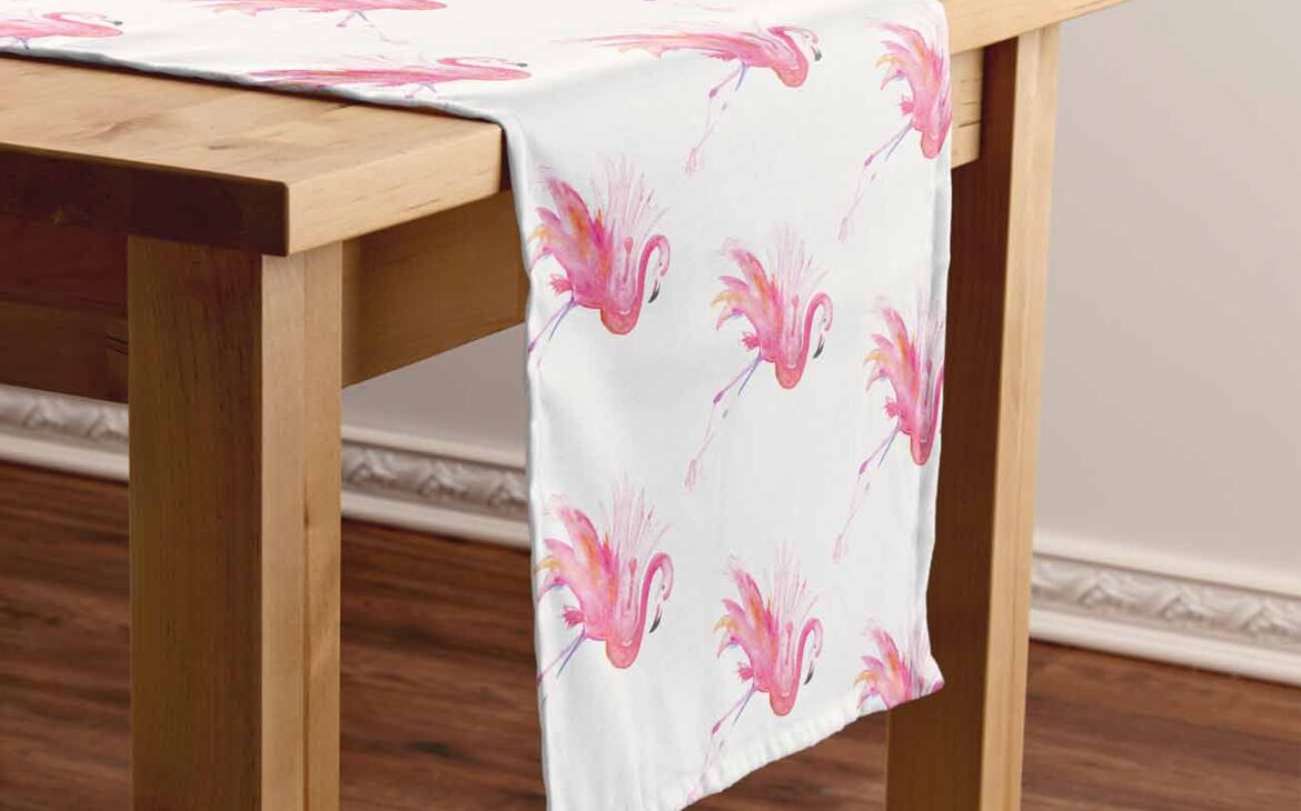 Florida room decor ideas features a cute pink flamingo pattern table runner. Pair it with our bright pink or turquoise blue table cloth for your next Pink Flamingo Day party. Tab the button below to shop.