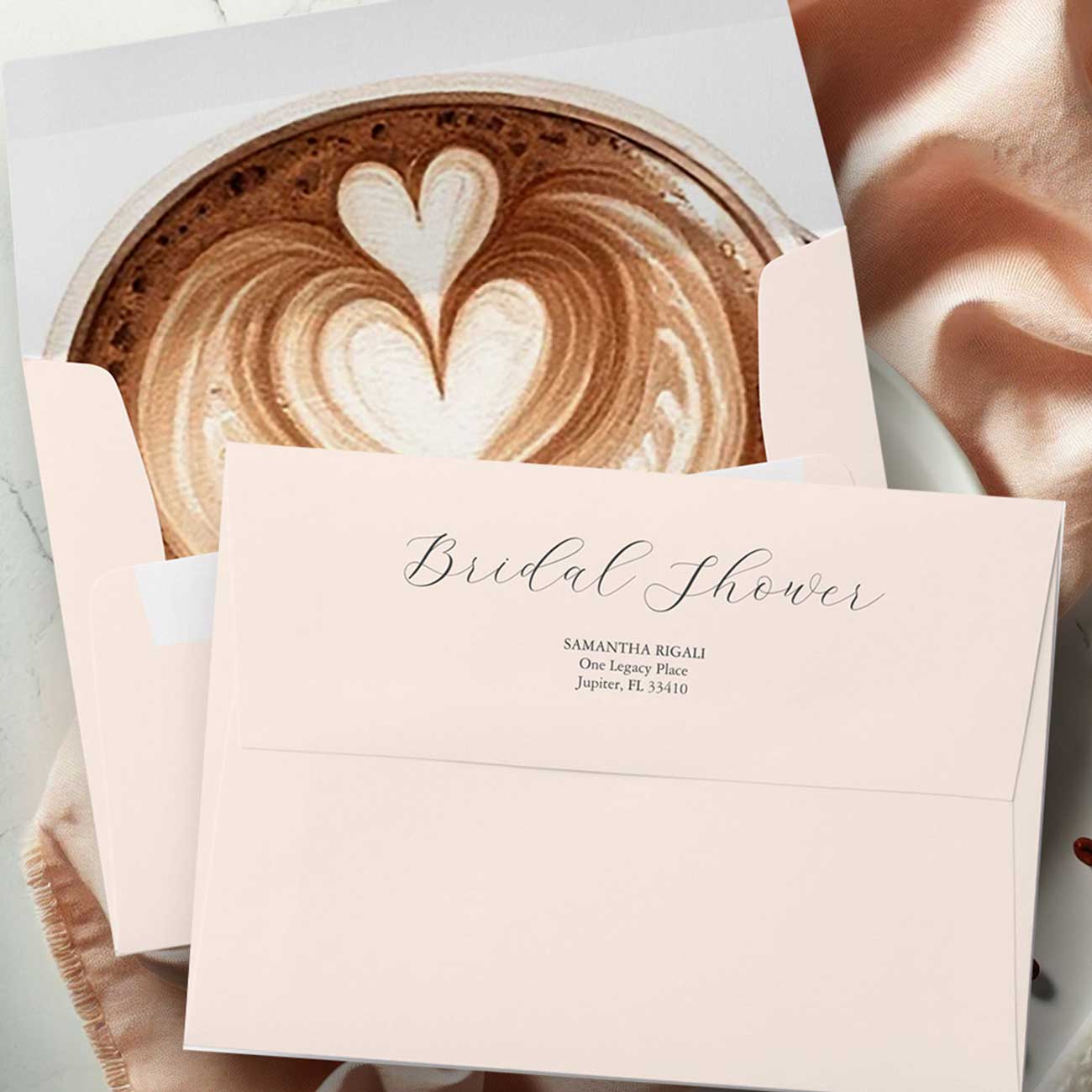 Flat lay of a bridal shower envelope with a coffee theme by Do Tell A Belle