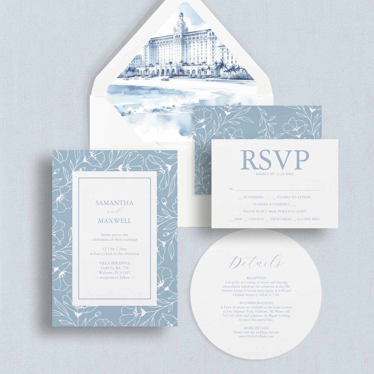 Flat lay of a custom dusty blue wedding invitation suite featuring hand-drawn floral line art and a watercolor wedding venue envelope liner, designed by Victoria of Do Tell A Belle, a small business in Palm Beach, Florida.