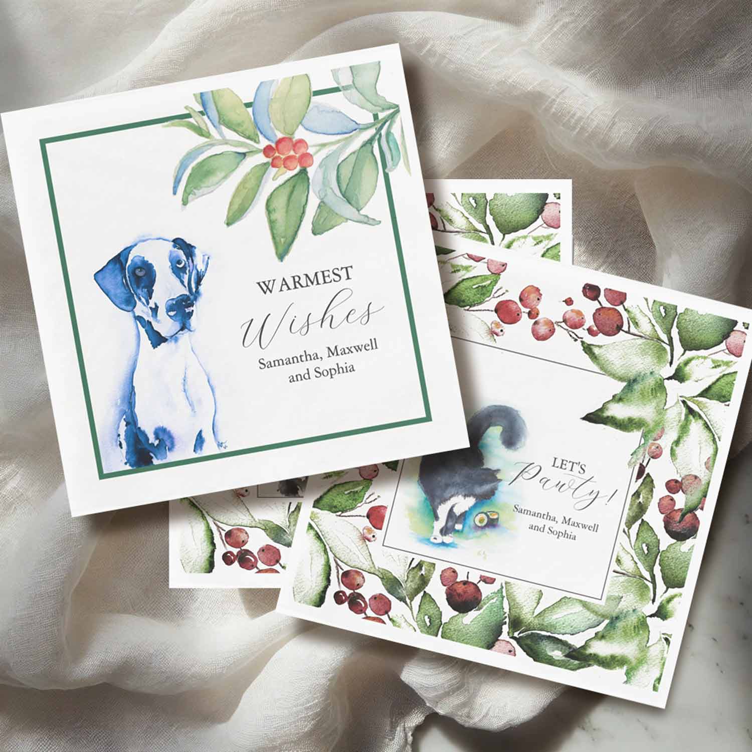 Watercolor pet portrait Christmas cocktail napkin featuring a Great Dane dog and watercolor cat surrounded by green pine boughs and red berries, designed for a winter bridal shower theme or holiday party. A custom, personalized napkin perfect for dog lovers planning a rustic winter wedding, Christmas bridal shower, or festive cocktail hour.