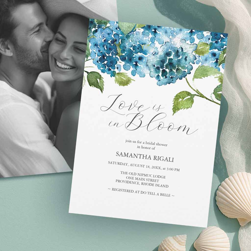 love is in bloom garden party bridal shower idea designed with hand painted watercolor hydrangeas by Florida watercolor artist Victoria Grigaliunas of Do Tell A Belle. Tap to shop this theme.