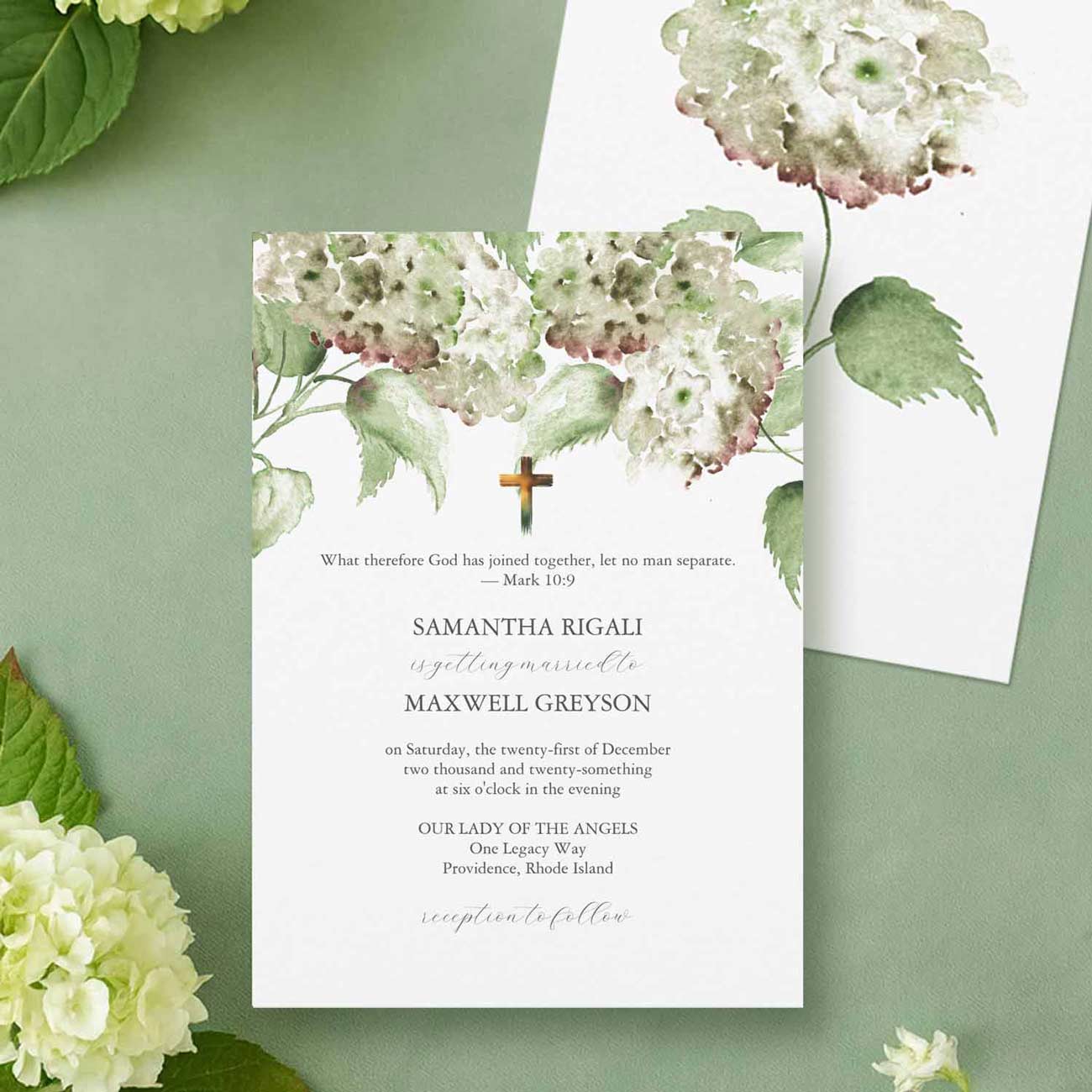 Catholic wedding invitation featuring hand-painted green watercolor hydrangea flowers and elegant floral wedding stationery.