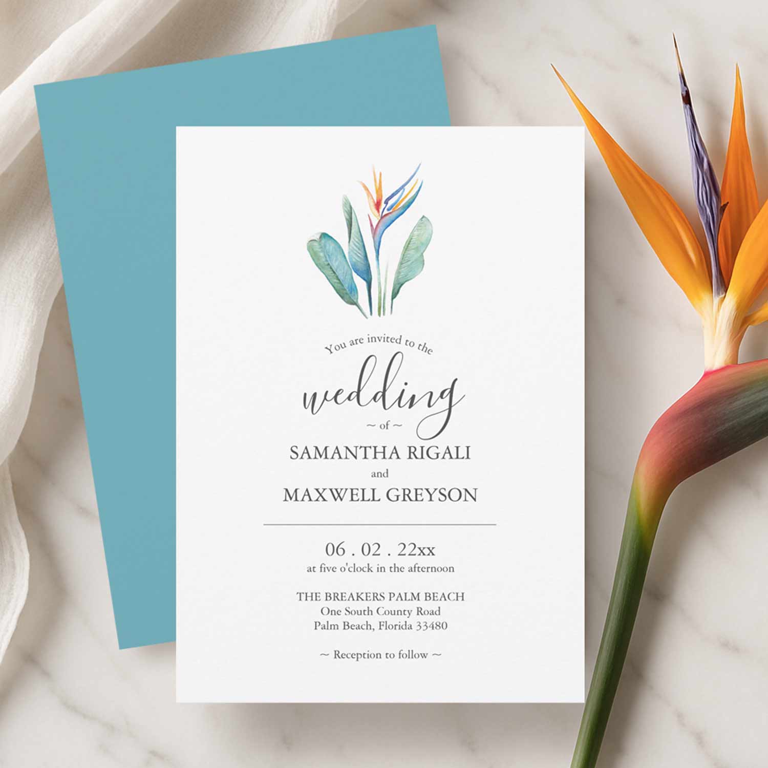 Tropical floral wedding invitation featuring a hand-painted watercolor bird of paradise flower and elegant minimalist wedding stationery design.