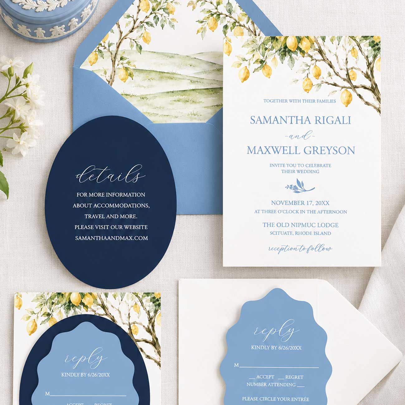Blue watercolor wedding invitations with yellow watercolor lemon trees, blue envelopes and die-cut RSVP and details cards.